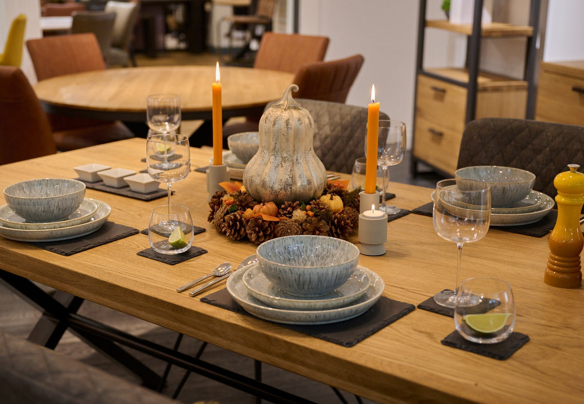 wooden dining table with autumn theme homewares 