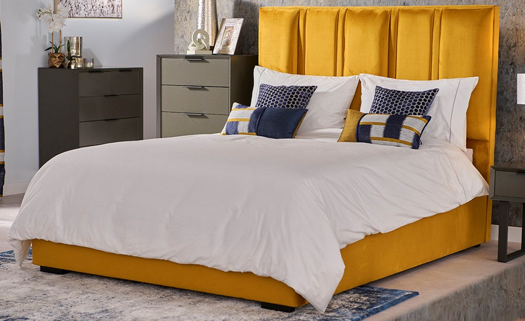 Mustard yellow velvet bed frame.