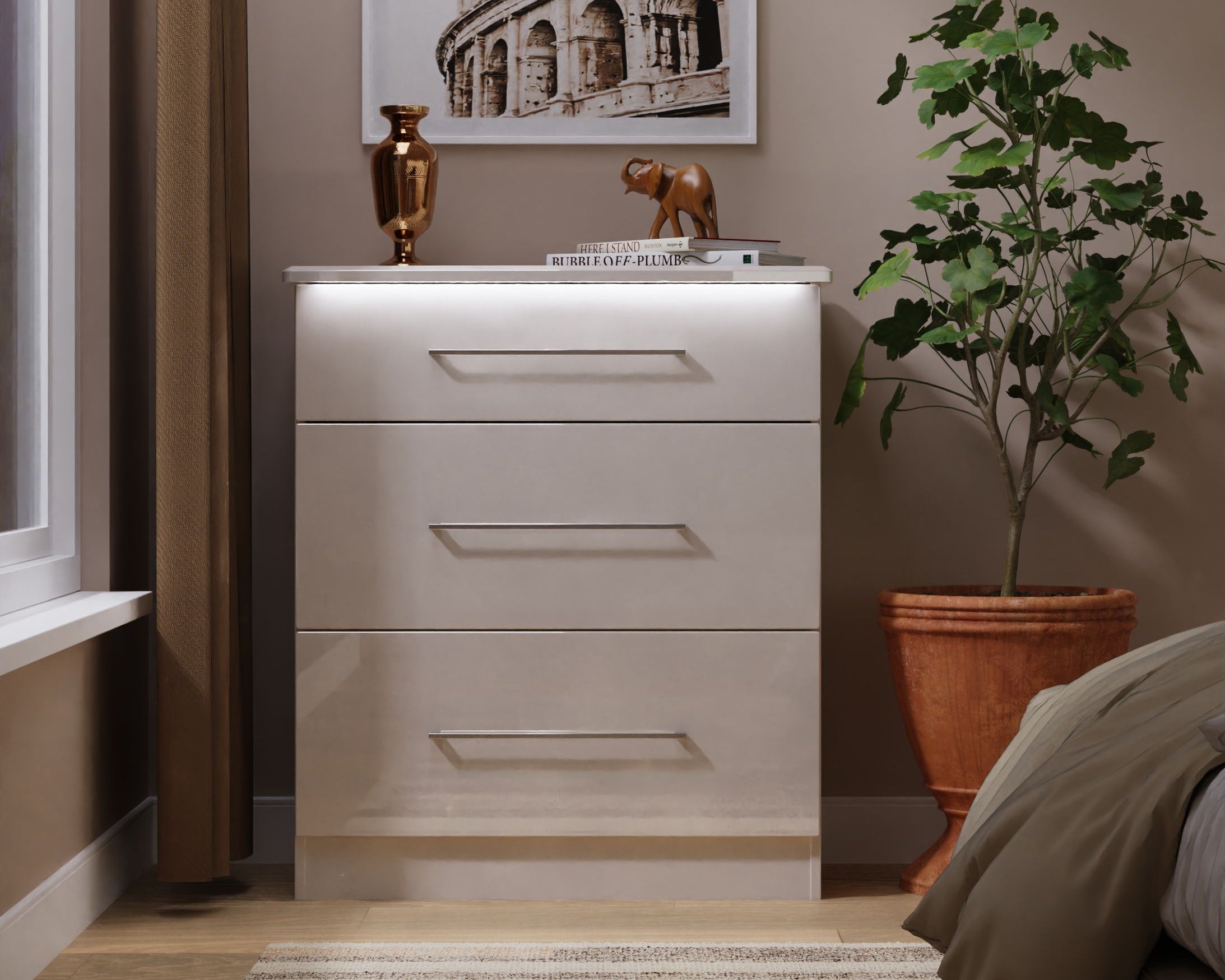 Cream dresser with decorative items in a bedroom setting