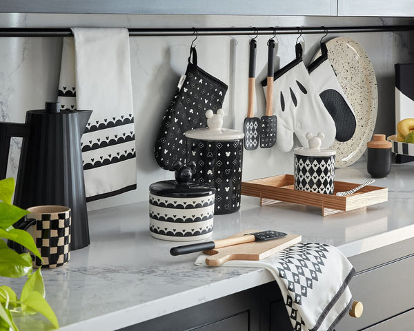 Modern kitchen counter with black and white patterned kitchenware