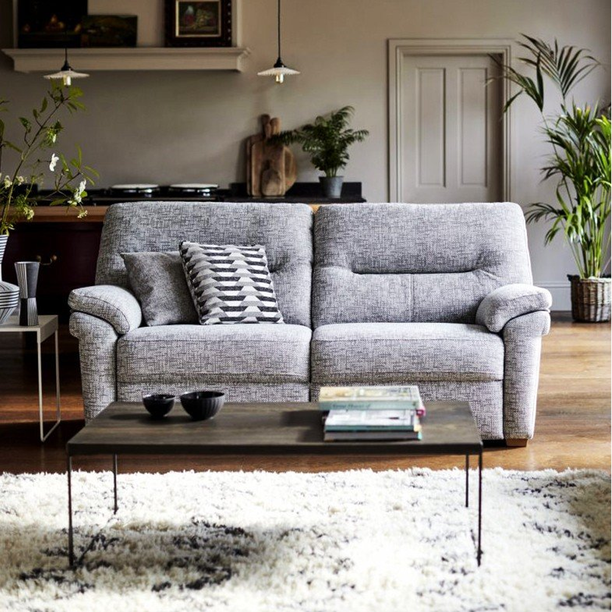 G Plan Seattle grey sofa with decorative pillows in a living room setting