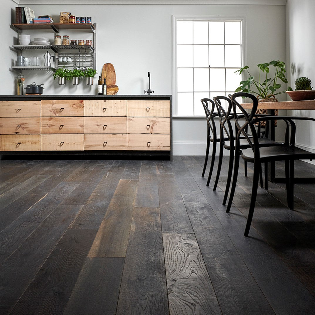 Modern kitchen with wooden cabinets and dark wood flooring