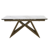 Dining table with marble-like top and geometric base on a white background