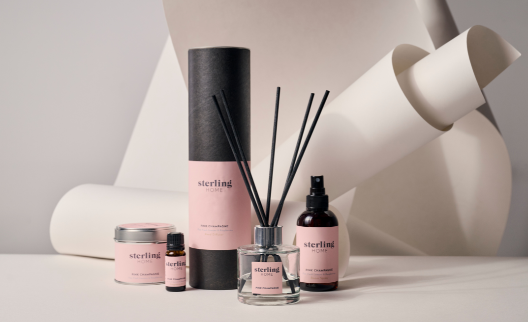 Collection of Sterling Scents products on a light background