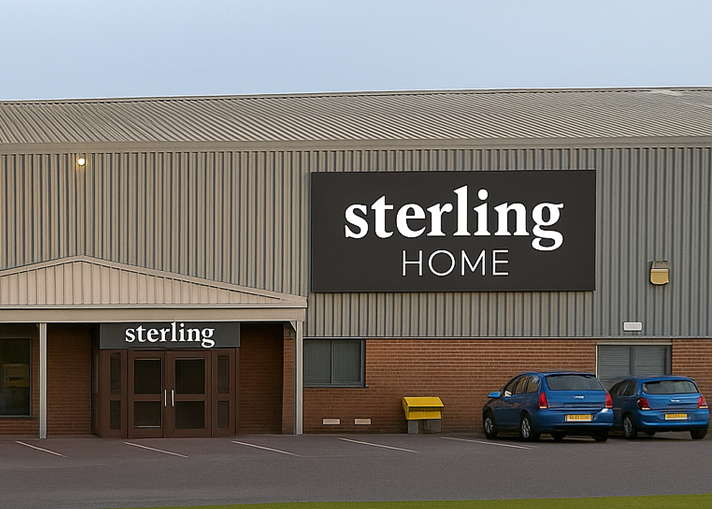 Building exterior with 'sterling HOME' sign and 'sterling' logo above doors.
