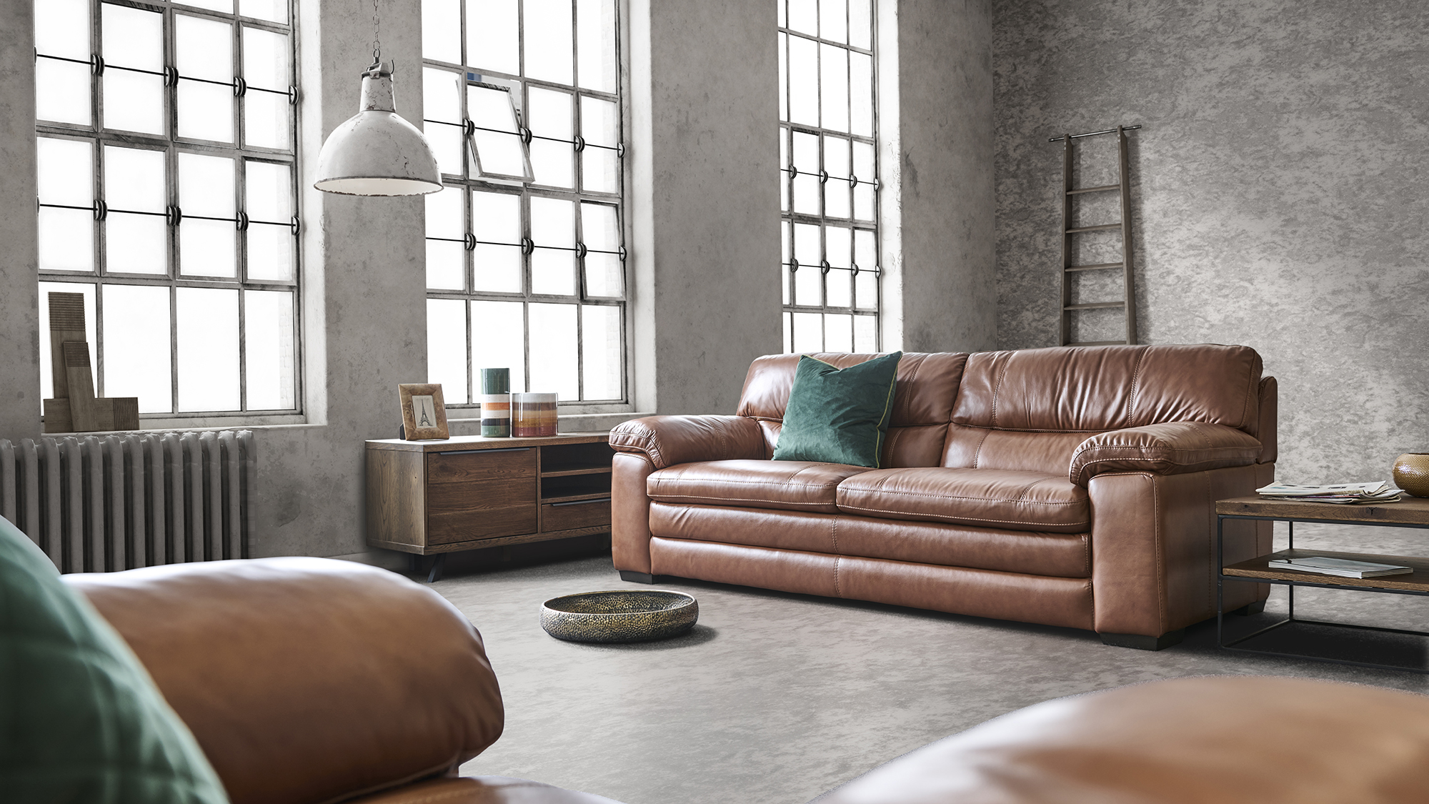 Brown leather deals couch grey walls